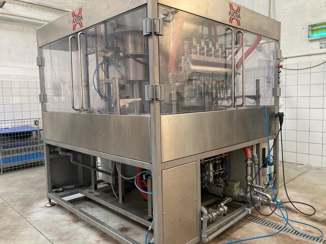 Used Axtra filling monoblock with labeller 4