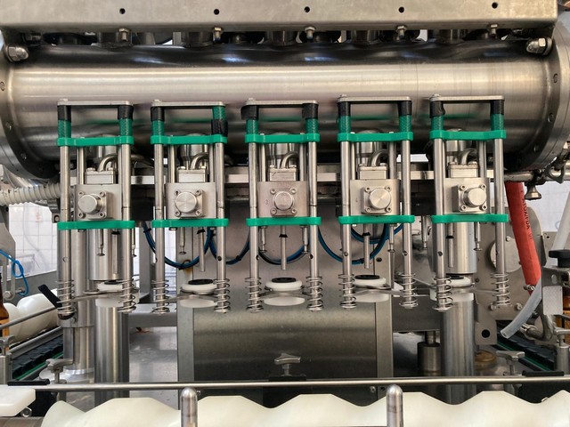 Used Axtra filling monoblock with labeller 6