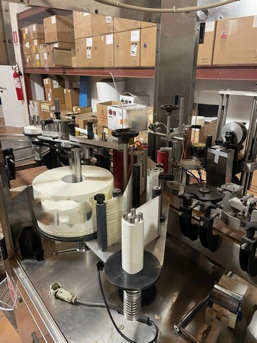 Used OMAR capsuling machine 2t polylaminate with 3s adhesive labeller 5