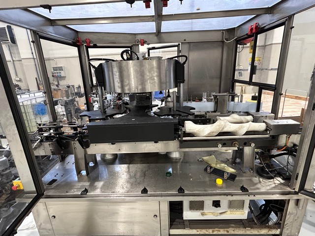 Used adhesive Kosme labeller 3