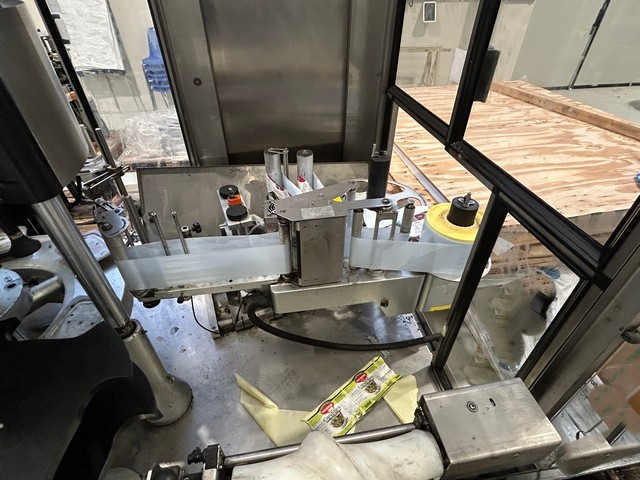 Used adhesive Kosme labeller 5