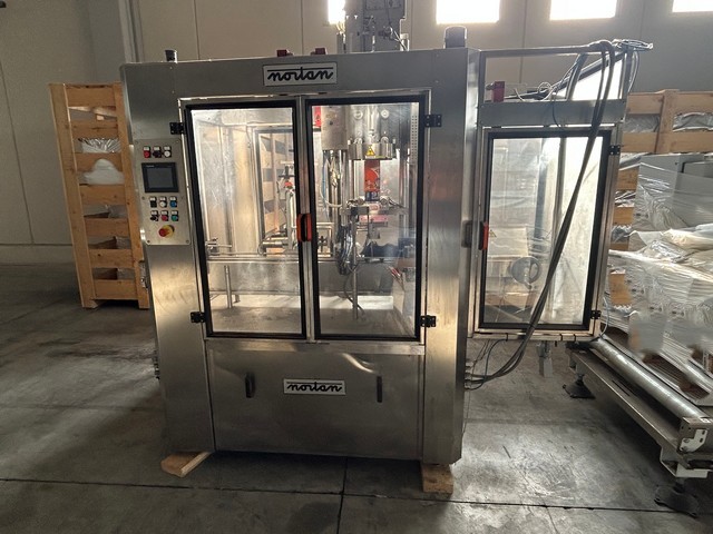 Used sleever machine Nortan 3