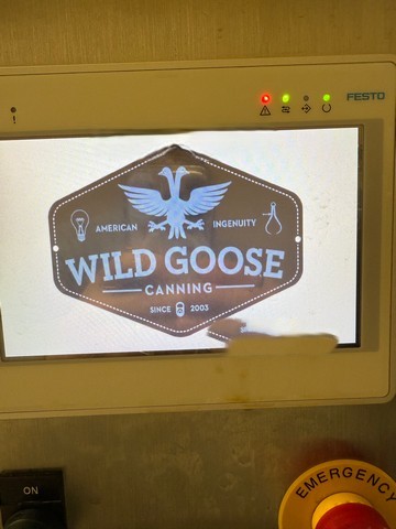 Used Wild Goose gravity canning line for beer 13