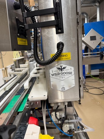 Used Wild Goose gravity canning line for beer 8