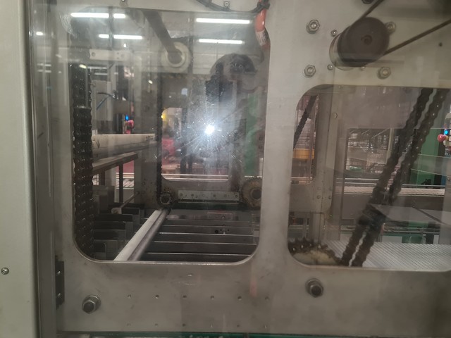 Used hot melt wrap Around Loeven 13