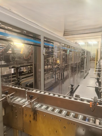 Used hot melt wrap Around Loeven 7
