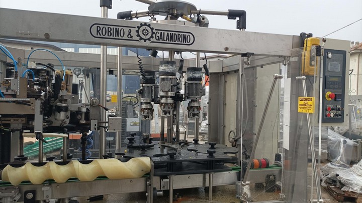 Used Robino e Galandrino capsuling machine for polylaminate and PVC capsules 4