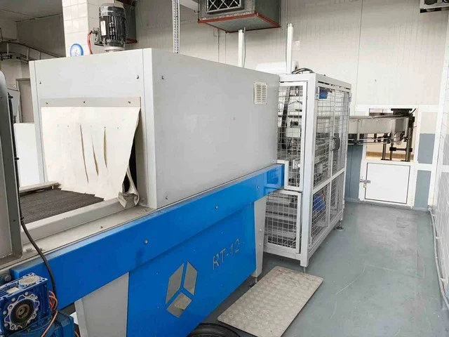 Used IMA shrink wrapper with sealing bar
