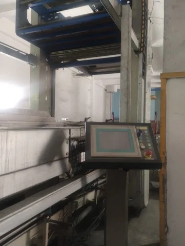 Palletizzatore Sacmi usato con avvolgipallet semiautomatico